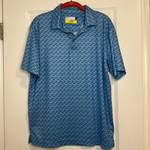 Nicklaus men’s size medium golf polo shirt short sleeve blue Hawaiian flowers